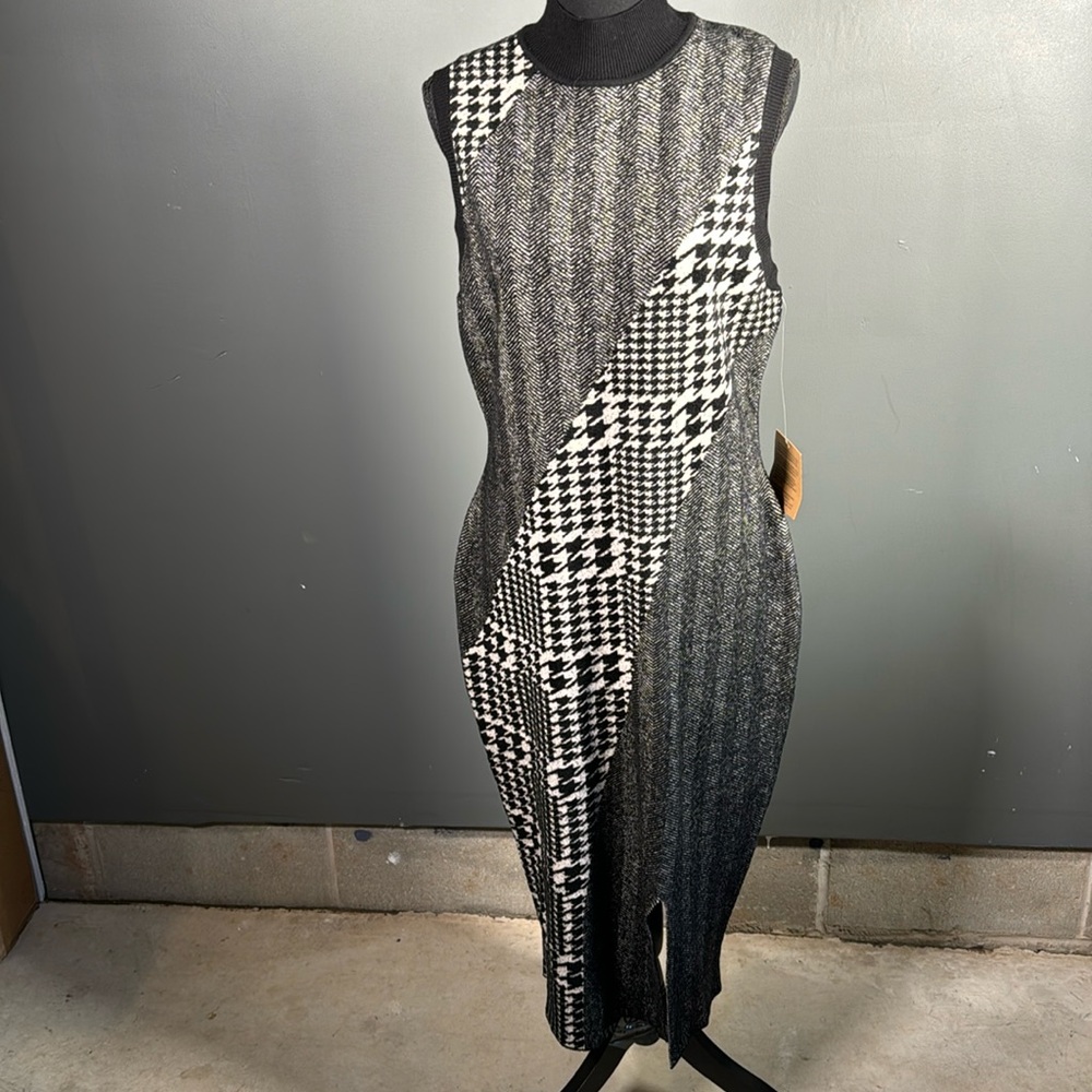Sweater dress will look good with a blazer and some boots